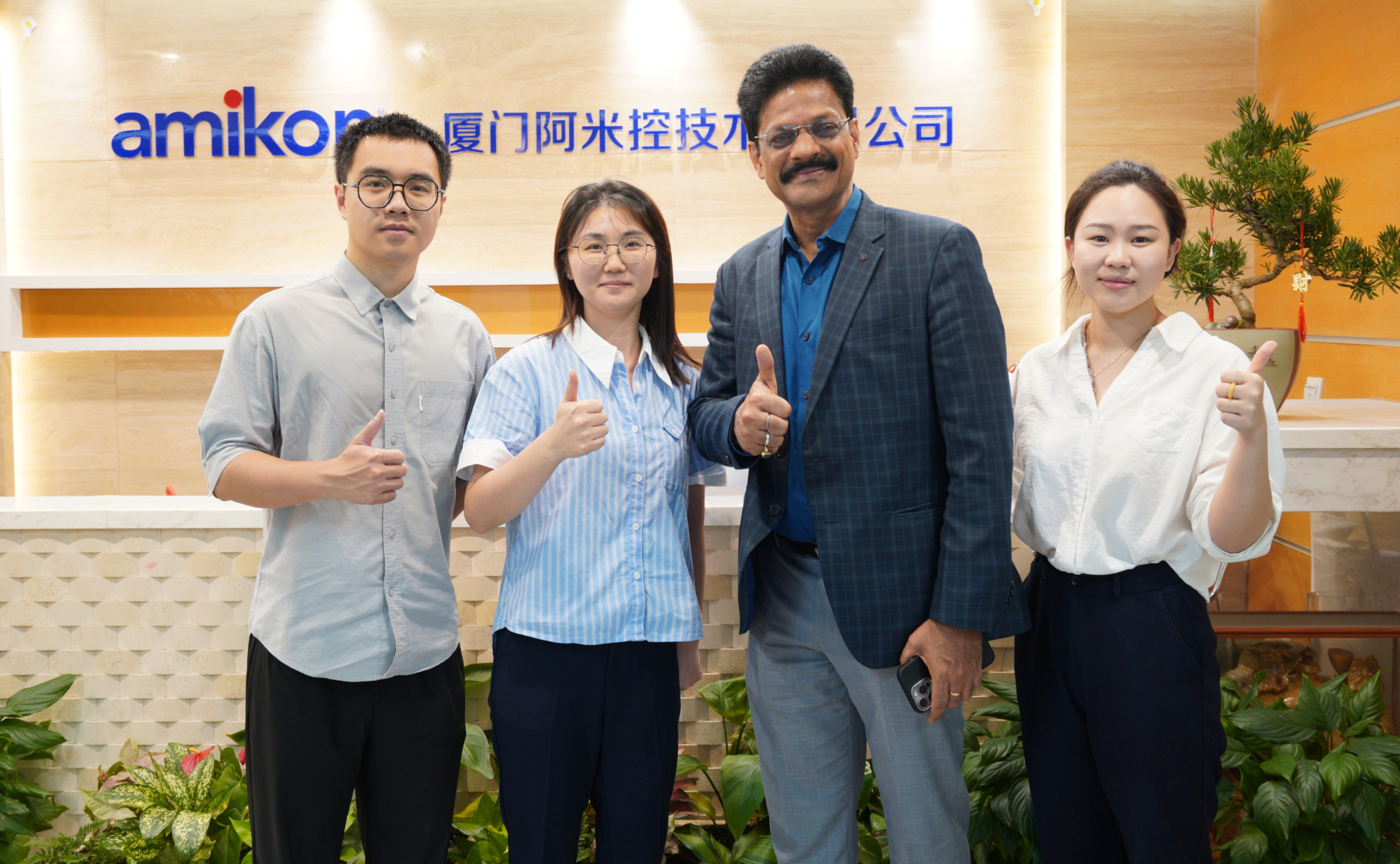 AMIKON team with customer